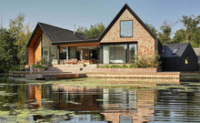 Load image into Gallery viewer, Marley shingles installed on a property on a lake