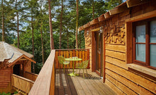 Load image into Gallery viewer, Marley Shingles installed vertically and horizontal on a treehouse property
